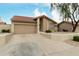 Charming one-story home featuring a tile roof, two-car garage, and desert landscaping at 4436 E Shomi St, Phoenix, AZ 85044