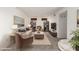 Comfortable living room showcases stylish furniture, bookcases, and a calming color palette at 4436 E Shomi St, Phoenix, AZ 85044