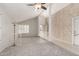 Open living area with tiled entry, high ceilings and plush carpet at 4436 E Shomi St, Phoenix, AZ 85044