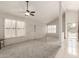Open living space with high ceilings, tiled entry and plush carpet at 4436 E Shomi St, Phoenix, AZ 85044
