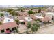 Overhead view of red tile roofs, patios, and desert landscaping in a residential community at 4436 E Shomi St, Phoenix, AZ 85044