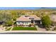Beautiful single-Gathering home with well-maintained landscaping and a desert backdrop under a clear blue sky at 5414 E Palo Brea Ln, Cave Creek, AZ 85331