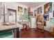 Well-lit art studio with multiple easels, diverse art pieces, and functional work spaces at 579 E Mary Ct, Gilbert, AZ 85295