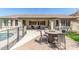 Inviting back patio with dining and lounge seating, offering a relaxing outdoor living space at 579 E Mary Ct, Gilbert, AZ 85295