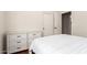 Bedroom with hardwood floors, a closet, and a dresser offering ample storage space at 579 E Mary Ct, Gilbert, AZ 85295