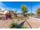 Vintage Ranch entrance sign surrounded by flowers and landscaping on a sunny day at 579 E Mary Ct, Gilbert, AZ 85295