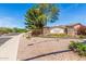 A stone Vintage Ranch community entrance sign, with beautiful trees and landscaping at 579 E Mary Ct, Gilbert, AZ 85295