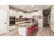 Spacious kitchen with large island, stainless steel appliances, ample cabinet space, and breakfast bar at 579 E Mary Ct, Gilbert, AZ 85295