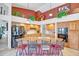 Gourmet kitchen featuring a large island with seating, granite countertops, and stainless steel appliances at 6158 W Donald Dr, Glendale, AZ 85310