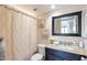 Cozy bathroom featuring a vanity with granite countertop and shower with curtain at 6240 N 16Th St # 45, Phoenix, AZ 85016