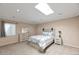 Neutral bedroom features carpet flooring and a bright skylight at 6240 N 16Th St # 45, Phoenix, AZ 85016