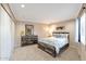 Comfortable bedroom with carpet flooring and ample natural light at 6240 N 16Th St # 45, Phoenix, AZ 85016