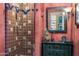 Charming bathroom featuring a tiled shower, colorful accents, and a unique vanity with mirror at 6301 N Camelback Manor Dr, Paradise Valley, AZ 85253