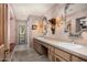 Stylish bathroom with dual sinks, decorative mirrors, and a separate entry for a luxurious experience at 6301 N Camelback Manor Dr, Paradise Valley, AZ 85253