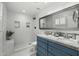 Modern bathroom featuring a double vanity, walk-in shower, and updated fixtures at 6340 E Mitchell Dr, Scottsdale, AZ 85251