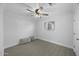 Bright bedroom with ceiling fan, window and neutral carpet and color scheme at 6340 E Mitchell Dr, Scottsdale, AZ 85251