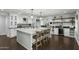 Spacious kitchen featuring a large island and a clear view into the adjacent Gathering room at 6340 E Mitchell Dr, Scottsdale, AZ 85251
