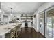 Bright, open-concept kitchen with stainless appliances and seamless indoor-outdoor transition at 6340 E Mitchell Dr, Scottsdale, AZ 85251