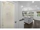 View of the beautifully appointed white kitchen from the pantry at 6340 E Mitchell Dr, Scottsdale, AZ 85251