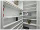 Organized pantry with white shelves at 6340 E Mitchell Dr, Scottsdale, AZ 85251
