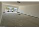 Expansive three car garage with a bright interior at 6460 E Omega Cir, Mesa, AZ 85215