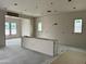 This modern kitchen space features recessed lighting, ample counter space, and large windows for natural light at 6460 E Omega Cir, Mesa, AZ 85215