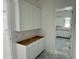 Bright white kitchen cabinets being installed, offering ample storage and a clean, modern aesthetic at 6460 E Omega Cir, Mesa, AZ 85215