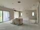 Spacious living room, under construction, featuring bright natural light and neutral wall colors at 6460 E Omega Cir, Mesa, AZ 85215