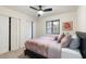 Inviting bedroom with light-colored walls, plush bedding, and spacious closet at 7110 E Continental Dr # 1044, Scottsdale, AZ 85257