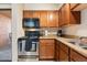 Well-equipped kitchen featuring granite countertops and stainless steel appliances at 7110 E Continental Dr # 1044, Scottsdale, AZ 85257