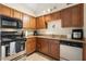 Efficient kitchen featuring granite countertops, stainless appliances and ample cabinet space at 7110 E Continental Dr # 1044, Scottsdale, AZ 85257