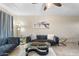 Comfortable living room with elegant decor and a ceiling fan for added comfort at 7110 E Continental Dr # 1044, Scottsdale, AZ 85257