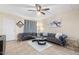 Relaxing living room with plush sofas, a decorative rug, and ample space for entertaining guests at 7110 E Continental Dr # 1044, Scottsdale, AZ 85257