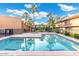 Community pool, hot tub and mature trees create a resort-like atmosphere at 7110 E Continental Dr # 1044, Scottsdale, AZ 85257