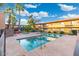 Relaxing community pool with a hot tub and palm trees, perfect for unwinding at 7110 E Continental Dr # 1044, Scottsdale, AZ 85257
