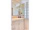 Elegant bathroom featuring stone countertops, a white sink, and lots of storage space in the cabinets and drawers at 7630 E Vaquero Dr, Scottsdale, AZ 85258