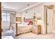 Bright bedroom with a well-lit space featuring a wooden bedframe and bedside table at 7630 E Vaquero Dr, Scottsdale, AZ 85258