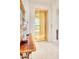 An interior shot showcasing a luxurious elevator with gold doors and marble surround in a high-end home at 7630 E Vaquero Dr, Scottsdale, AZ 85258