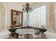 Bright bathroom showcases a corner tub with granite surround, decorative mirror, and glass block window at 8427 E Preserve Way, Scottsdale, AZ 85266