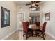 Dining area with bright windows, tile flooring, and decorative furnishings at 8427 E Preserve Way, Scottsdale, AZ 85266