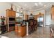 A kitchen featuring custom cabinetry, stainless steel appliances, and a breakfast bar at 8427 E Preserve Way, Scottsdale, AZ 85266