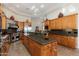 A kitchen featuring custom cabinetry, stainless steel appliances, and granite countertops at 8427 E Preserve Way, Scottsdale, AZ 85266