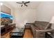 Comfortable living room with a leather sectional couch and TV at 8427 E Preserve Way, Scottsdale, AZ 85266