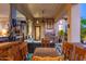 Entertain or relax on the patio offering plenty of space, a television, and dining and living areas at 8427 E Preserve Way, Scottsdale, AZ 85266