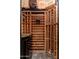 Spacious wine cellar with wooden racks ready to store your wine collection at 8427 E Preserve Way, Scottsdale, AZ 85266