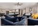 Open-concept living room and kitchen area, featuring modern furniture and appliances at 8750 E Starlight Way, Scottsdale, AZ 85250
