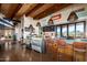 Bright cafe with high ceilings, menu boards, and comfortable seating area with mountain views at 8751 S 168Th Dr, Goodyear, AZ 85338