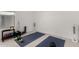 Home gym includes workout mats, fitness accessories, and a window for natural light at 8751 S 168Th Dr, Goodyear, AZ 85338
