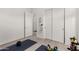 Functional home gym space with closet, workout mats, and exercise equipment at 8751 S 168Th Dr, Goodyear, AZ 85338