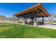 Outdoor pavilion with seating, offering a relaxing space to enjoy the beautiful scenery at 8751 S 168Th Dr, Goodyear, AZ 85338